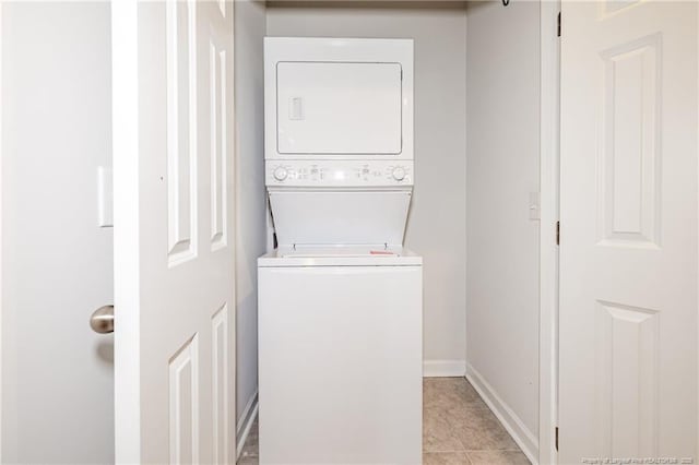 234 Hugh Shelton Loop, Fayetteville, NC 28301 - laundry area with stacked washer / dryer and baseboards