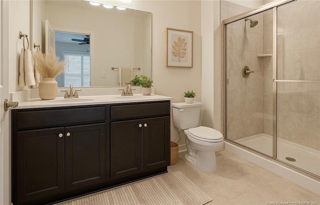 234 Hugh Shelton Loop, Fayetteville, NC 28301 - full bathroom with a shower stall, toilet, double vanity, and tile patterned flooring