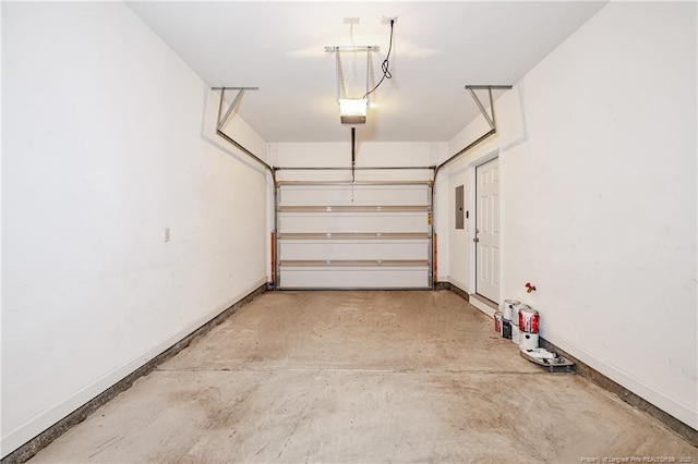 234 Hugh Shelton Loop, Fayetteville, NC 28301 - garage featuring baseboards and a garage door opener