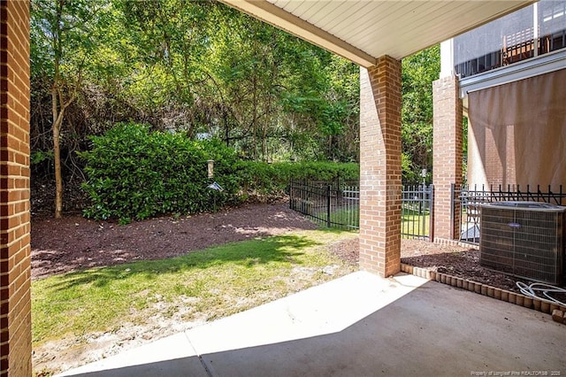 234 Hugh Shelton Loop, Fayetteville, NC 28301 - view of patio / terrace featuring central AC and fence