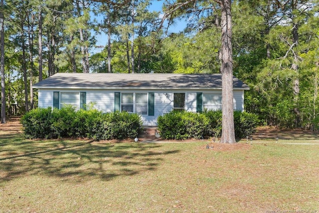view of front of property with a front lawn