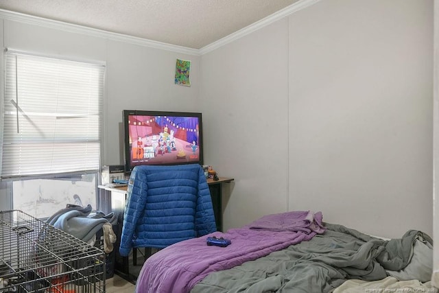 bedroom with multiple windows, a textured ceiling, and crown molding