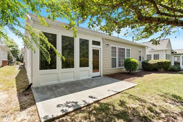 803 Footbridge Pl, Cary, NC 27519 - rear view of house with a yard and a patio