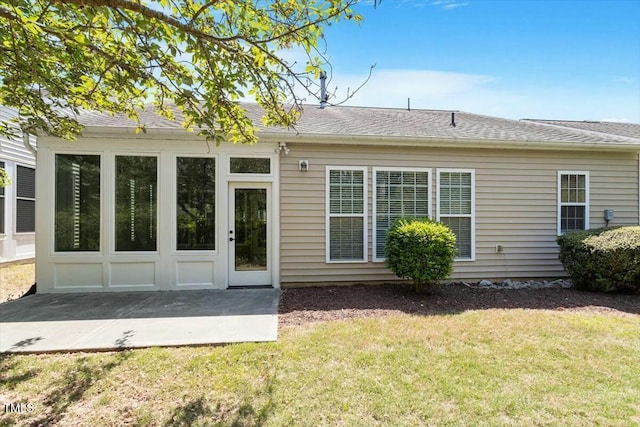 803 Footbridge Pl, Cary, NC 27519 - rear view of house featuring a patio area, a lawn, and roof with shingles