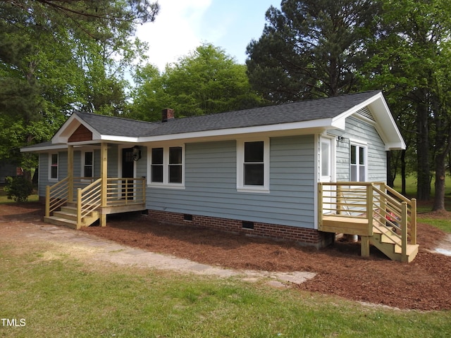 1165 John Mitchell Rd, Youngsville, NC 27596 - ranch-style house featuring roof with shingles, a chimney, and crawl space