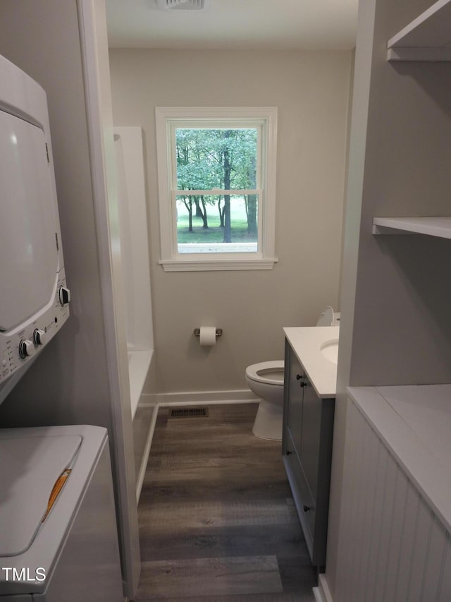 1165 John Mitchell Rd, Youngsville, NC 27596 - full bathroom featuring walk in shower, vanity, toilet, baseboards, and wood finished floors