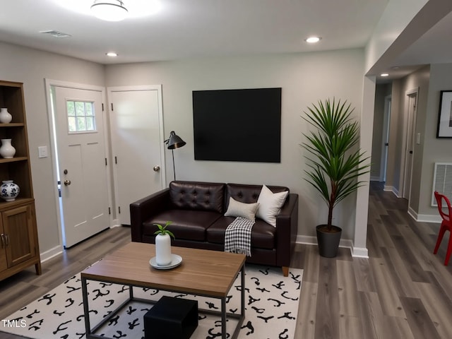 1165 John Mitchell Rd, Youngsville, NC 27596 - living room with baseboards, recessed lighting, wood finished floors, and visible vents