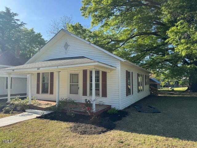 207 Harris St, Norlina, NC 27563 - exterior space featuring a yard and covered porch