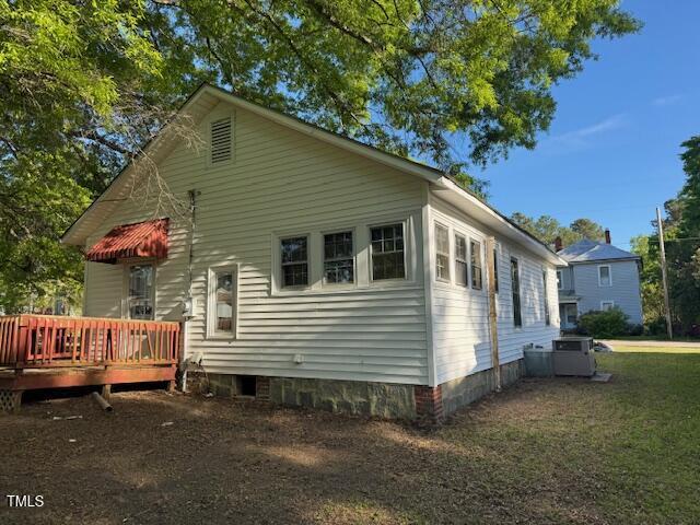 207 Harris St, Norlina, NC 27563 - view of home's exterior with central air condition unit and a deck