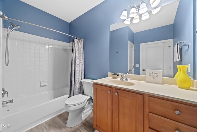 bathroom featuring toilet, shower / bathtub combination with curtain, wood finished floors, and vanity