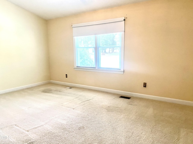 5500 Fortunes Ridge Dr Unit 82B, Durham, NC 27713 - carpeted spare room with baseboards