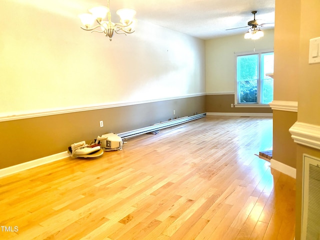 5500 Fortunes Ridge Dr Unit 82B, Durham, NC 27713 - spare room featuring wood finished floors, a chandelier, a ceiling fan, and baseboard heating