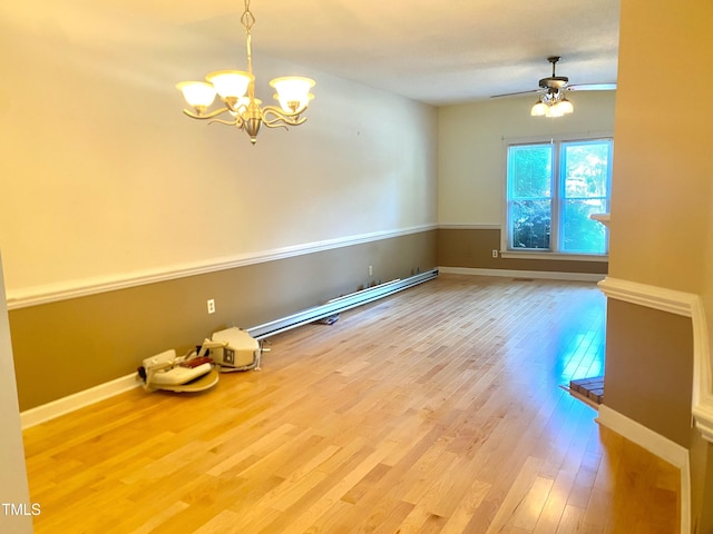 5500 Fortunes Ridge Dr Unit 82B, Durham, NC 27713 - unfurnished room featuring a chandelier, wood finished floors, and a ceiling fan