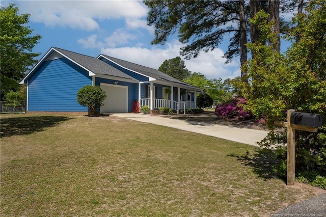 204 Bayfield Loop, Fayetteville, NC 28314 - single story home with covered porch, a garage, a front lawn, and driveway