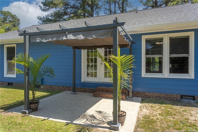 204 Bayfield Loop, Fayetteville, NC 28314 - property entrance featuring roof with shingles, a patio, crawl space, a lawn, and french doors