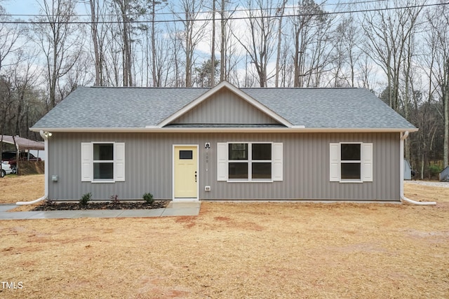 view of front of home with roof with shingles
