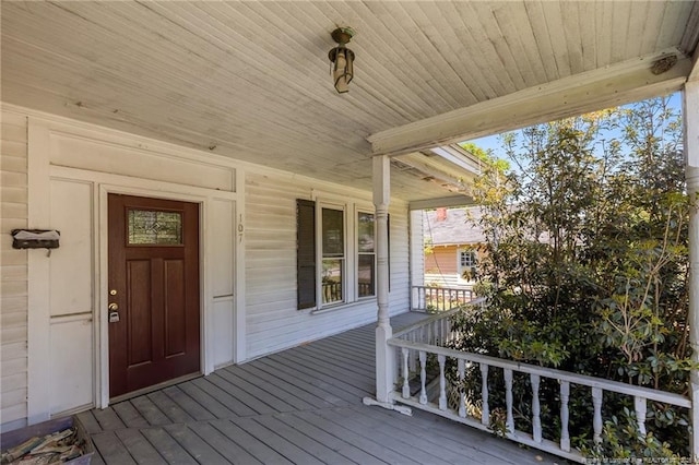 107 Church St, Red Springs, NC 28377 - wooden deck featuring a porch