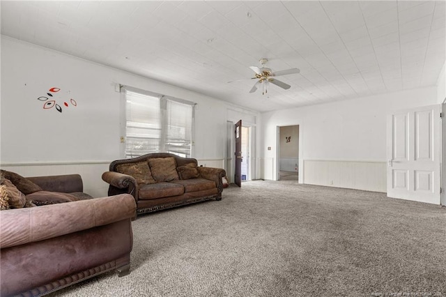 107 Church St, Red Springs, NC 28377 - living room with wainscoting, carpet floors, and ceiling fan