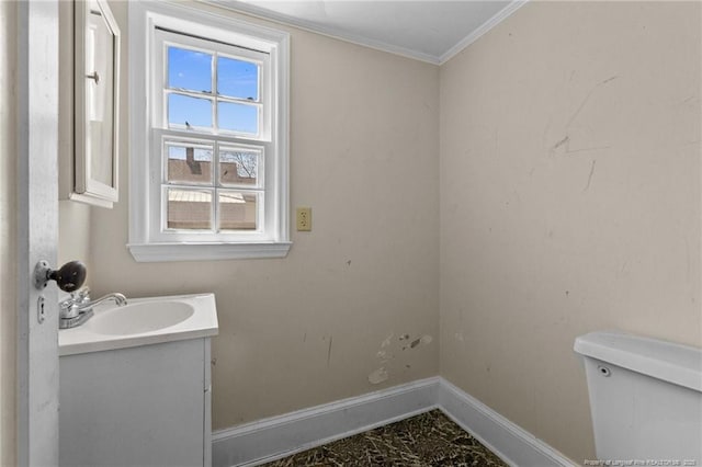 107 Church St, Red Springs, NC 28377 - half bathroom featuring marble finish floor, toilet, vanity, ornamental molding, and baseboards
