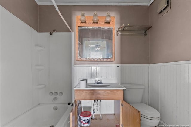 107 Church St, Red Springs, NC 28377 - bathroom with vanity, toilet, a wainscoted wall, and shower / tub combination
