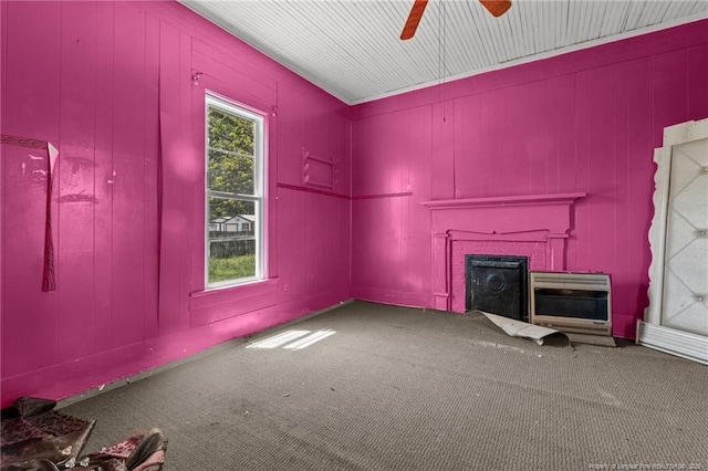 107 Church St, Red Springs, NC 28377 - unfurnished living room with a fireplace, carpet floors, a ceiling fan, and heating unit