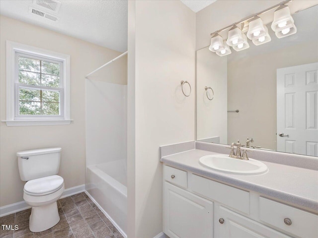 full bathroom featuring toilet, baseboards, vanity, and  shower combination