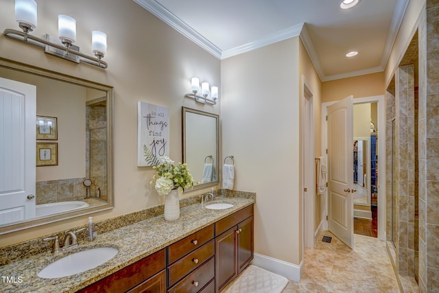 bathroom with double vanity, a sink, and ornamental molding