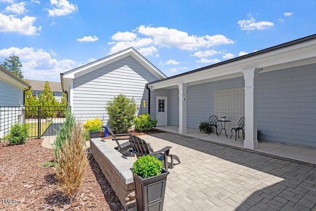 view of patio / terrace with fence