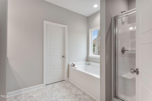 3803 Huntcliff Dr, La Grange, NC 28551 - bathroom with a stall shower, a garden tub, and baseboards