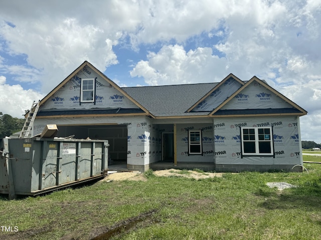 3803 Huntcliff Dr, La Grange, NC 28551 - unfinished property featuring a front lawn, a porch, a shingled roof, and an attached garage