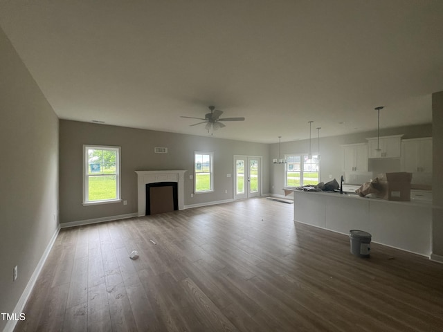 3803 Huntcliff Dr, La Grange, NC 28551 - unfurnished living room with a ceiling fan, wood finished floors, baseboards, and a fireplace