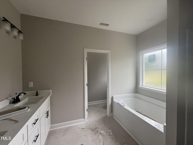 3803 Huntcliff Dr, La Grange, NC 28551 - full bathroom featuring a bath, double vanity, and baseboards