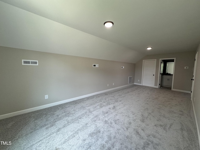 3803 Huntcliff Dr, La Grange, NC 28551 - bonus room featuring carpet and vaulted ceiling