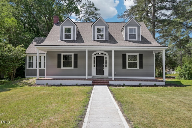 1331 Sunset Ave, Rocky Mount, NC 27804 - cape cod house featuring a porch, a chimney, and a front lawn