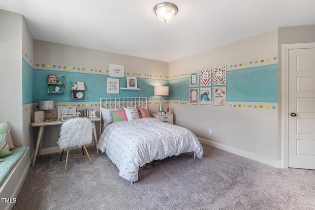 carpeted bedroom with baseboards
