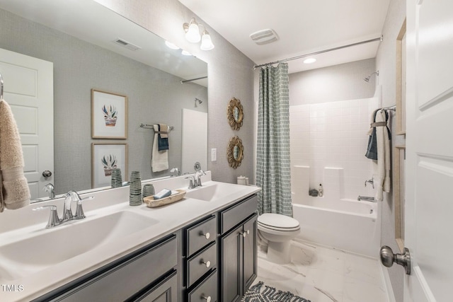 bathroom with a sink, toilet, visible vents, and shower / tub combo
