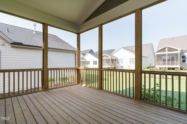 unfurnished sunroom with a residential view