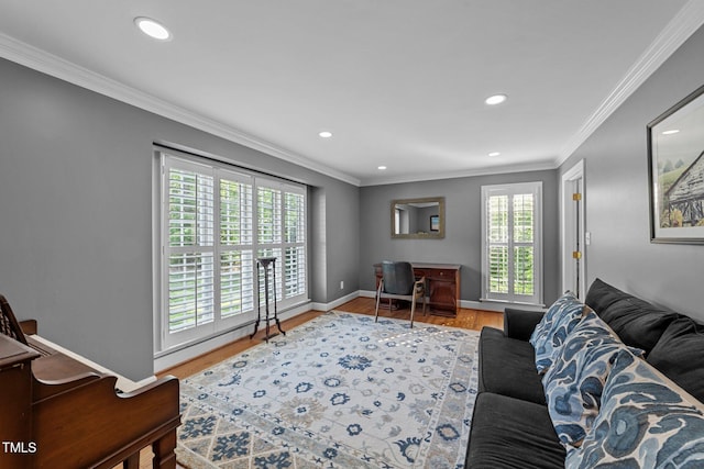 2409 Beechview Ct, Raleigh, NC 27615 - living room with light wood-style floors, recessed lighting, crown molding, and baseboards