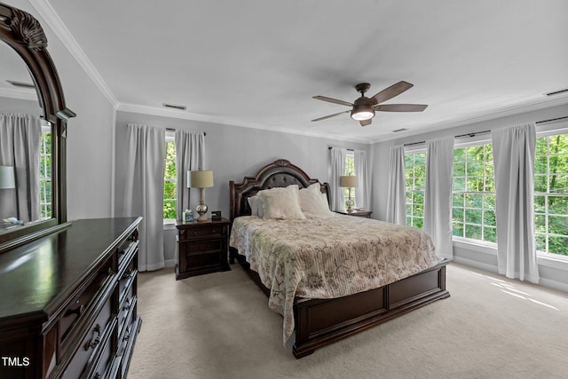 2409 Beechview Ct, Raleigh, NC 27615 - bedroom with light colored carpet, crown molding, ceiling fan, and baseboards