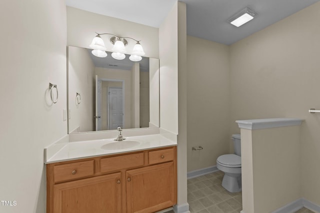 3212 Imperial Oaks Dr, Raleigh, NC 27614 - bathroom with toilet, vanity, and baseboards