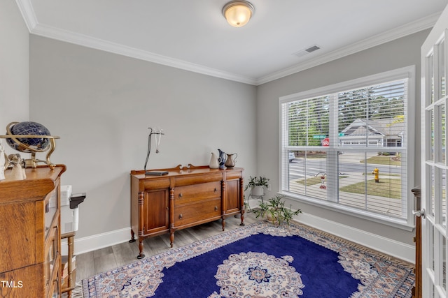 704 Haven Peak Ln, Wake Forest, NC 27587 - living area with ornamental molding and wood finished floors