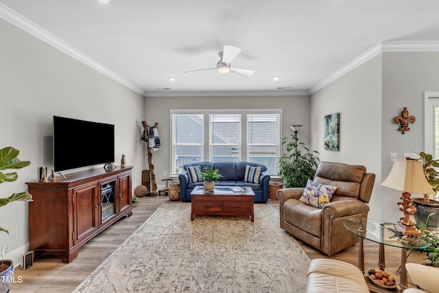 704 Haven Peak Ln, Wake Forest, NC 27587 - living room featuring a ceiling fan, light wood-style floors, ornamental molding, and recessed lighting