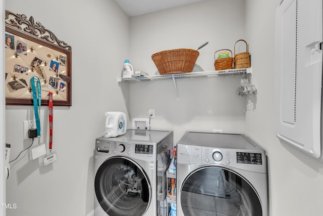 704 Haven Peak Ln, Wake Forest, NC 27587 - laundry room featuring washer and dryer