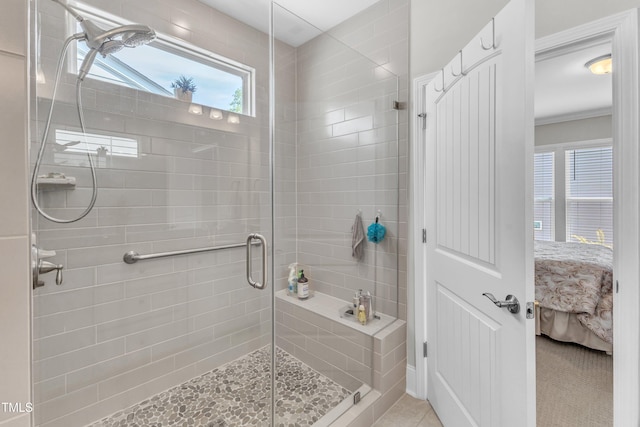 704 Haven Peak Ln, Wake Forest, NC 27587 - bathroom with ensuite bathroom, healthy amount of natural light, a stall shower, and tile patterned floors