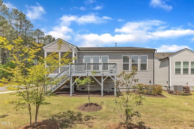 704 Haven Peak Ln, Wake Forest, NC 27587 - back of property featuring a wooden deck, stairway, a lawn, and a shingled roof