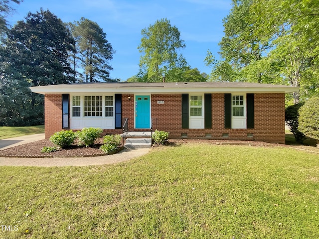 3504 Crofton Ct, Raleigh, NC 27604 - ranch-style home featuring a front lawn and brick siding