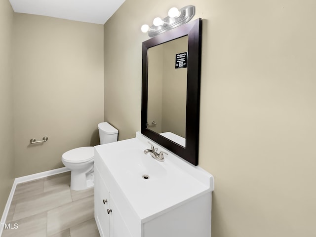 3504 Crofton Ct, Raleigh, NC 27604 - half bath featuring baseboards, vanity, and toilet