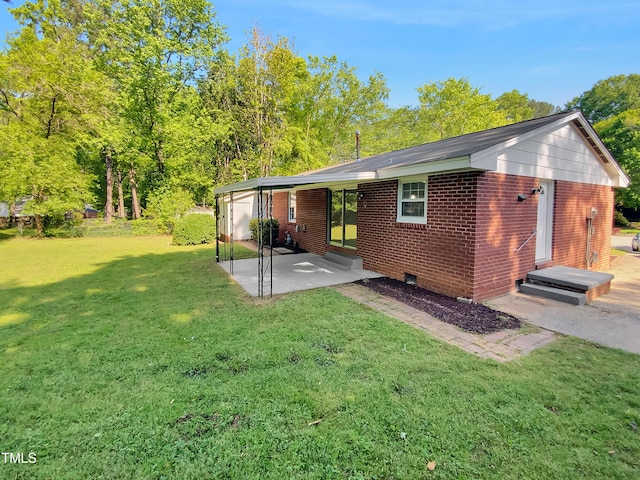3504 Crofton Ct, Raleigh, NC 27604 - rear view of property featuring entry steps, a patio area, brick siding, and a yard