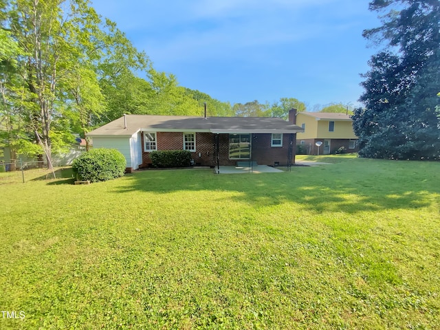 3504 Crofton Ct, Raleigh, NC 27604 - back of house with a lawn, brick siding, and a patio