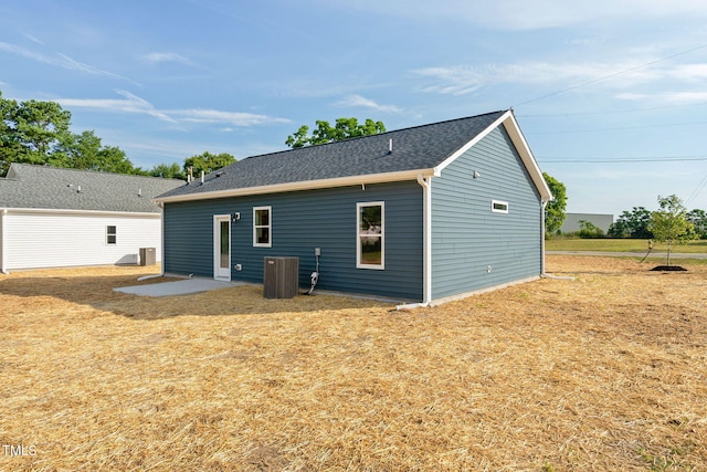 back of property with cooling unit